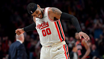 Trail Blazers forward Carmelo Anthony celebrates against the Chicago Bulls.