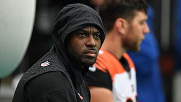 AJ Green watches the Cincinnati Bengals from the sideline against the Miami Dolphins.