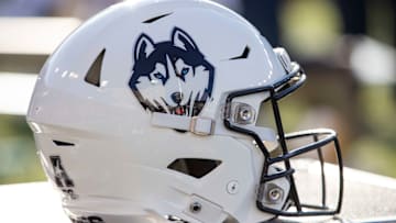 UConn football helmet sits idly. 