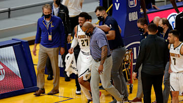 Jamal Murray se lesionó la rodilla ante los Warriors