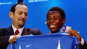 Freddy Adu (R), a 14-year-old soccer pro