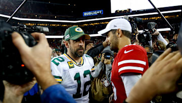 Aaron Rodgers and Jimmy Garoppolo meet post-game following San Francisco's Week 12 win.
