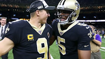 Saints quarterbacks Drew Brees, left, and Teddy Bridgewater embrace on the field after a win over the Colts. 