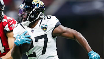 Jaguars running back Leonard Fournette makes a run on the outside during a game against the Falcons.