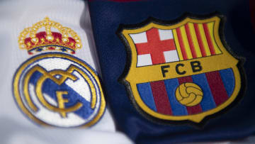 The crests of Real Madrid and Barcelona