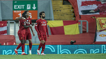 Liverpool's fabled front three celebrate their 4-0 win over Crystal Palace
