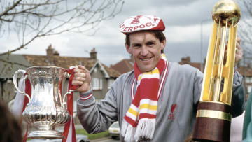 Kenny Dalglish celebrates his league/cup double