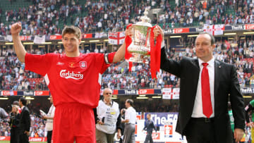 Liverpool manager Raphael Benitez (R) an