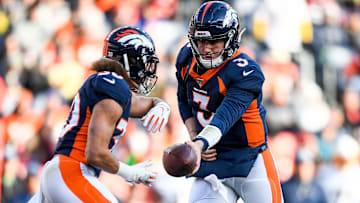 Denver Broncos running back Phillip Lindsay and QB Drew Lock