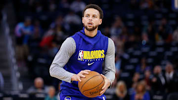 Golden State Warriors point guard Steph Curry warming up for a game against the Miami Heat. 