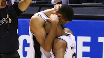 San Antonio Spurs Patty Mills, Tim Duncan