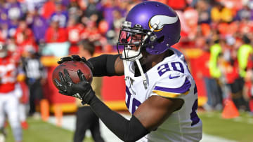 Minnesota Vikings' star corner Mackensie Alexander ruled out prior to pivotal playoff clash.