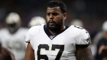 The New Orleans Saints cut offensive lineman Larry Warford on Friday.