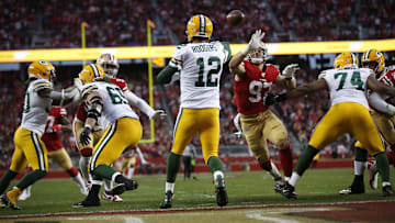 Packers quarterback Aaron Rodgers releases a pass backed up against his own end zone in the NFC Championship against the 49ers.