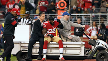 49ers RB Tevin Coleman being carted off the field