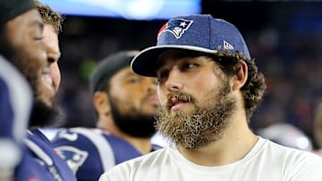 Andrews watching on the sideline in a game vs. the Giants