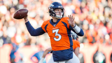 Drew Lock loading up to throw a pass vs. the Raiders