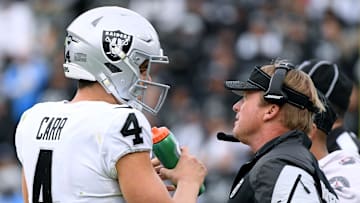 Derek Carr and Jon Gruden of the Raiders