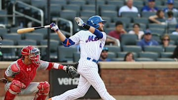 Lowrie takes a hack in one of his only at-bats in New York