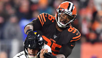 Browns defensive end Myles Garrett grabs Steelers quarterback Mason Rudolph