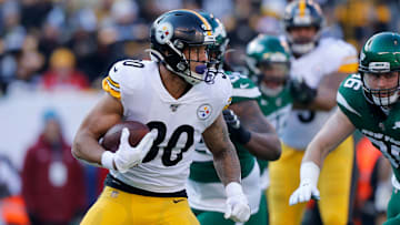 James Conner navigating through defenders in a game vs. the New York Jets