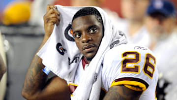 The Justice Department has charged former NFL running back Clinton Portis for three crimes.