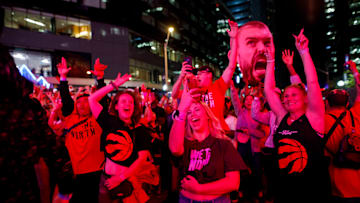 Raptors Fans Gather At 'Jurassic Park' In Toronto To Watch Their Team's First NBA Finals Series