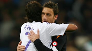 Roma's captain Francesco Totti (R) hugs