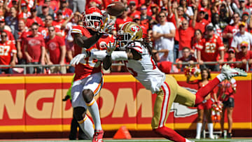 Chiefs WR Tyreek Hill attempting to catch a pass against 49ers CB Richard Sherman