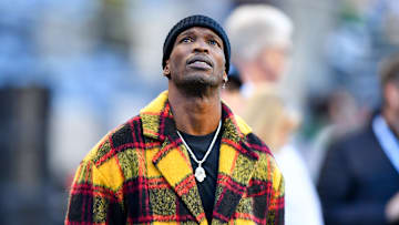 Chad Johnson looks up at the scoreboard during a game between the 49ers and Seahawks.