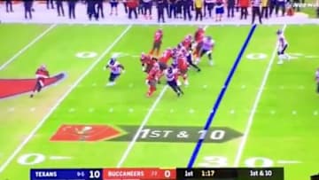 Jameis Winston rolling out against the Houston Texans. 
