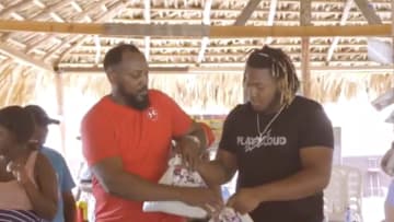 Vladimir Guerrero and Vlad Jr. give back to nearly 600 families in the Dominican Republic.