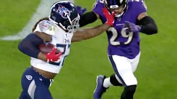 Derrick Henry delivered a stiff arm to Earl Thomas that spun the safety around. 