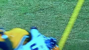 Green Bay Packers TE Jimmy Graham was clearly short of the first down.