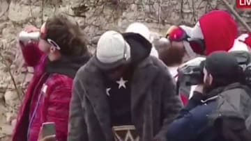 Patrick Mahomes chugs a beer during the Kansas City Chiefs Super Bowl parade