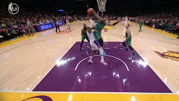 Los Angeles Lakers' LeBron James and Boston Celtics' Daniel Theis collide.