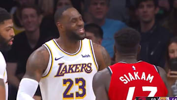 LeBron James and Pascal Siakam jokingly argue on foul call in Sunday's Lakers-Raptors game.