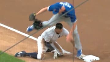 Giancarlo Stanton was removed from Tuesday's game after getting his finger stepped on.