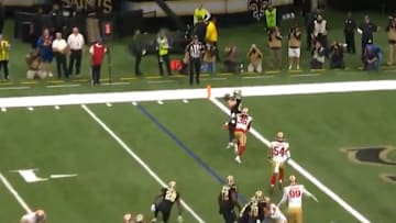 Josh Hill catches a touchdown pass from Drew Brees to extend the New Orleans Saints' lead.