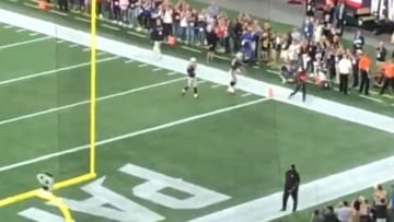 Tom Brady pumps up Gillette Stadium crowd with fist pump prior to Sunday's kickoff.