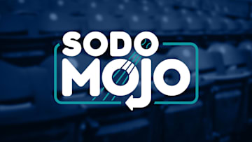 Apr 25, 2016; Seattle, WA, USA; Seattle Mariners manager Scott Servais (9, right) talks with general manager Jerry Dipoto during batting practice before a game against the Houston Astros at Safeco Field. Mandatory Credit: Joe Nicholson-USA TODAY Sports