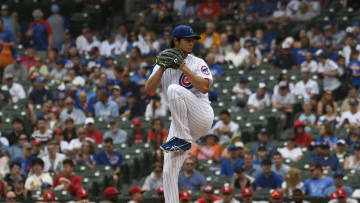 Darvish winds up for a pitch against St. Louis