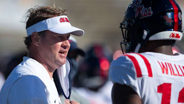 Mississippi head coach Lane Kiffin will miss the Rebels' season opener after testing positive for COVID-19, despite being fully vaccinated.