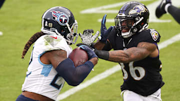 Derrick Henry stiff arm. 