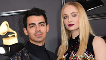 Sophie Turner seemingly debuts baby bump while on walk with Joe Jonas.