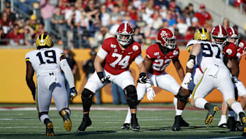 Alabama's Jedrick Wills Jr. (No. 74) taking on Michigan in his final game with the Crimson Tide