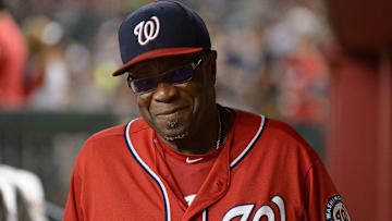 Dusty Baker walking through the Nationals dugout during a game against the Arizona Diamondbacks.