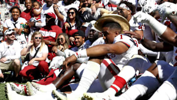 DALLAS, TEXAS - OCTOBER 12: Jalen Hurts #1 of the Oklahoma Sooners wears the Golden Hat trophy after defeating the Texas Longhorns 34-27 during the 2019 AT&T Red River Showdown at Cotton Bowl on October 12, 2019 in Dallas, Texas. (Photo by Ronald Martinez/Getty Images)