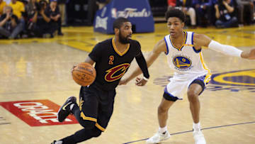 OAKLAND, CA - JUNE 12: Kyrie Irving #2 of the Cleveland Cavaliers drives to the basket against the Golden State Warriors in Game Five of the 2017 NBA Finals on June 12, 2017 at Oracle Arena in Oakland, California. NOTE TO USER: User expressly acknowledges and agrees that, by downloading and or using this photograph, user is consenting to the terms and conditions of Getty Images License Agreement. Mandatory Copyright Notice: Copyright 2017 NBAE (Photo by Bruce Yeung/NBAE via Getty Images)