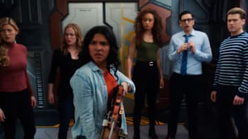 Legends of Tomorrow -- "Silence of the Sonograms" -- Image Number: LGN613fg_0032r.jpg -- Pictured (L-R): Jes Macallan as Ava, Caity Lotz as Sara Lance, Lisseth Chavez as Esperanza "Spooner", Olivia Swann as Astra Logue, Adam Tsekhman as Gary Green and Nick Zano as Nate Heywood/Steel -- Photo: The CW -- © 2021 The CW Network, LLC. All Rights Reserved.